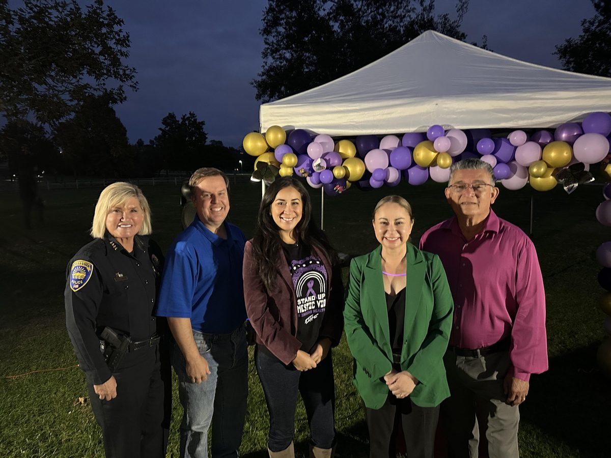 Dr. Rodriguez with law enforcement and community partners