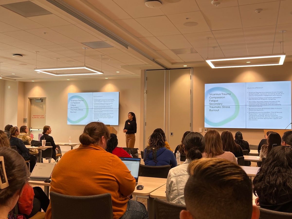 Dr. Vanessa Rodriguez presenting on trauma and resilience
